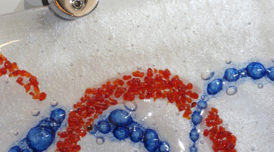 Close up of Amour fused glass wall art by Vitreus Art