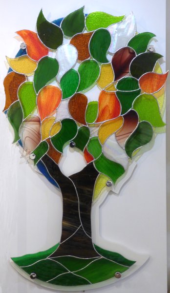 Stained glass art mounted on a board ready for wall hanging