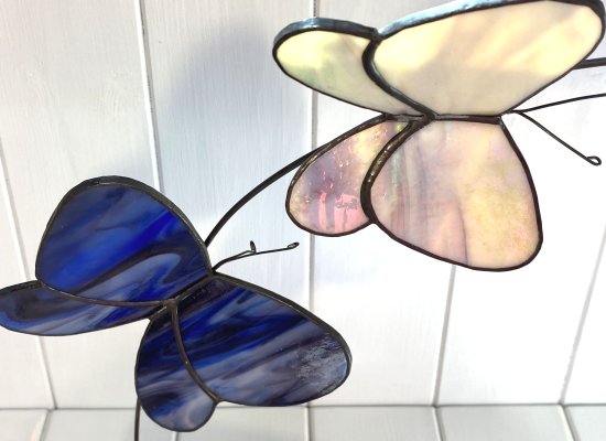 Copper foiled stained glass butterflies on a reclaimed wooden base made by Vitreus Art