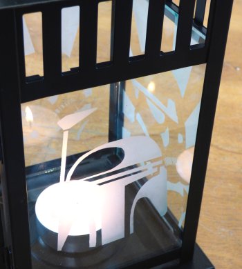 Etch glass panels for a candle lantern