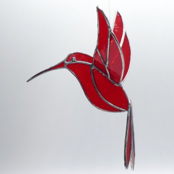 Close up of Vitreus Art hummingbird in copper foil